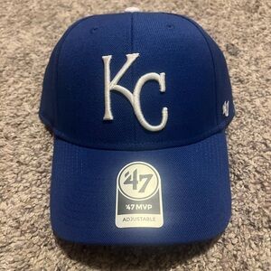 blue kansas city royals and red st. louis mlb hats